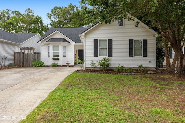view of front of house featuring concrete driveway