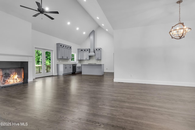 140 E Ag Dr, New Bern, NC 28562 - unfurnished living room with high vaulted ceiling, a tile fireplace, baseboards, a ceiling fan, and recessed lighting