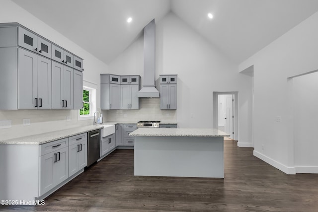 140 E Ag Dr, New Bern, NC 28562 - kitchen featuring appliances with stainless steel finishes, high vaulted ceiling, wall chimney range hood, a center island, and gray cabinets