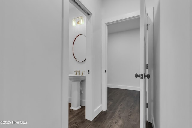 140 E Ag Dr, New Bern, NC 28562 - bathroom featuring wood finished floors and baseboards