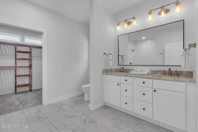 140 E Ag Dr, New Bern, NC 28562 - full bath with marble finish floors, toilet, double vanity, baseboards, and a shower