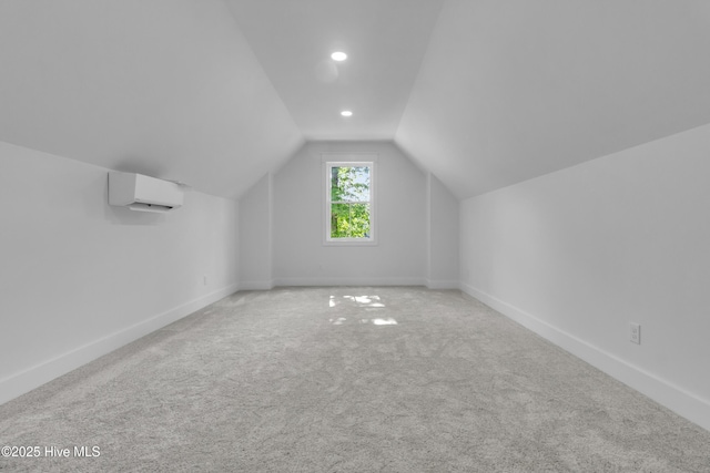 140 E Ag Dr, New Bern, NC 28562 - additional living space featuring a wall mounted air conditioner, lofted ceiling, carpet, baseboards, and recessed lighting