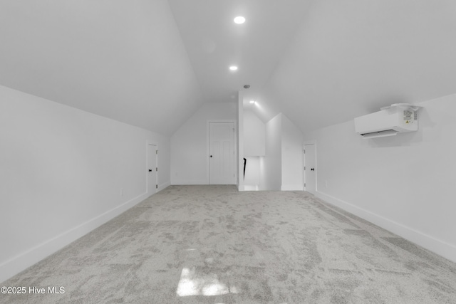 140 E Ag Dr, New Bern, NC 28562 - additional living space featuring a wall mounted air conditioner, vaulted ceiling, carpet floors, baseboards, and recessed lighting