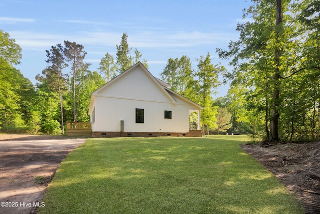 140 E Ag Dr, New Bern, NC 28562 - view of property exterior featuring crawl space, a lawn, and a deck