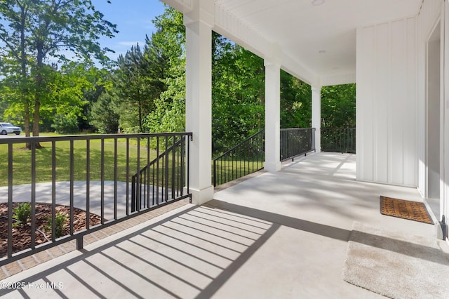 140 E Ag Dr, New Bern, NC 28562 - view of patio with covered porch and view of scattered trees