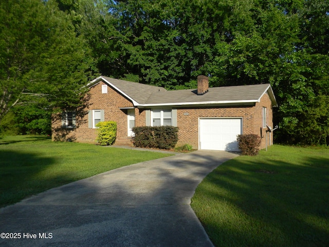 341 Britt Rd, Greenville, NC 27858 - view of front facade featuring a garage, a chimney, driveway, and a front yard