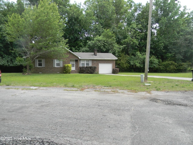 341 Britt Rd, Greenville, NC 27858 - single story home with an attached garage, a front yard, and brick siding