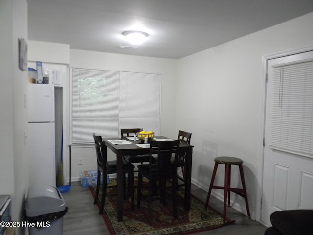 341 Britt Rd, Greenville, NC 27858 - dining area featuring wood finished floors and baseboards