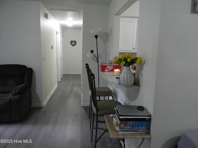 341 Britt Rd, Greenville, NC 27858 - hall with attic access, wood finished floors, and baseboards