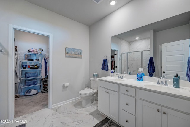 6909 English Holly Ct SW, Ocean Isle Beach, NC 28469 - full bath with a marble finish shower, marble finish flooring, a spacious closet, double vanity, and recessed lighting