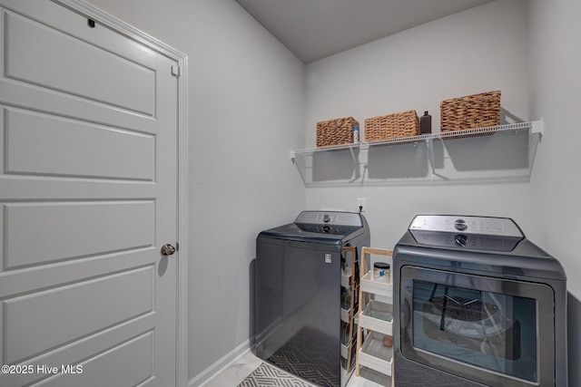 6909 English Holly Ct SW, Ocean Isle Beach, NC 28469 - laundry room featuring independent washer and dryer and baseboards