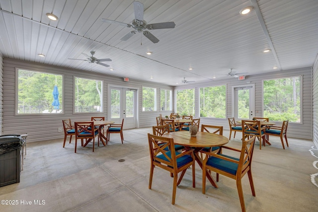 6909 English Holly Ct SW, Ocean Isle Beach, NC 28469 - dining room featuring plenty of natural light, french doors, ceiling fan, recessed lighting, and wooden ceiling