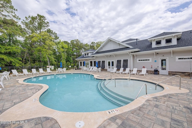 6909 English Holly Ct SW, Ocean Isle Beach, NC 28469 - community pool featuring fence and a patio