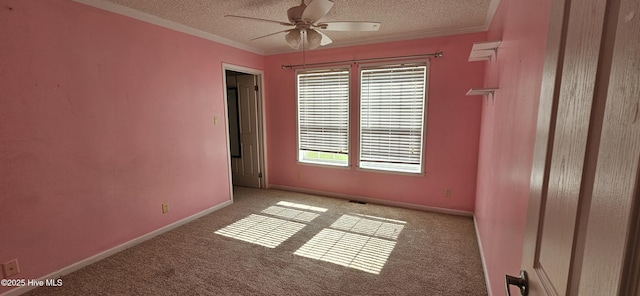 1970 Old Raleigh Rd, Clinton, NC 28328 - spare room with ceiling fan, a textured ceiling, carpet floors, crown molding, and baseboards