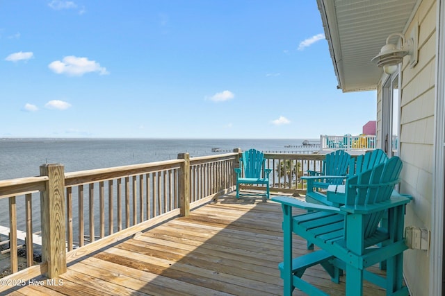 deck featuring a water view