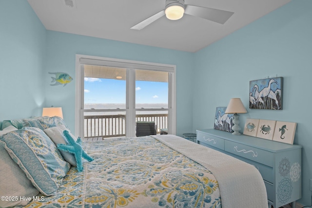 bedroom featuring access to outside and a ceiling fan