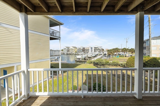 balcony featuring a water view