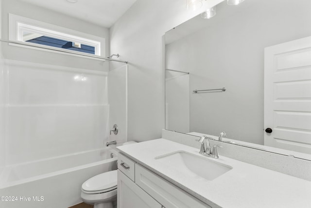 full bath with toilet, vanity, and shower / tub combination
