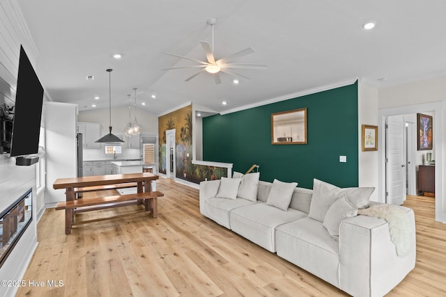 921 Whitecaps Ln, Carolina Beach, NC 28428 - living area with a ceiling fan, ornamental molding, vaulted ceiling, light wood-style floors, and recessed lighting