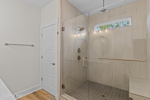 921 Whitecaps Ln, Carolina Beach, NC 28428 - full bath with a shower stall and wood finished floors