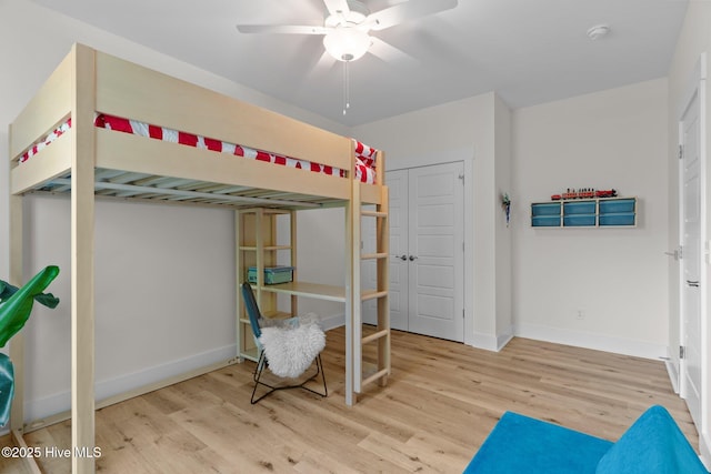921 Whitecaps Ln, Carolina Beach, NC 28428 - bedroom featuring wood finished floors, baseboards, and a ceiling fan