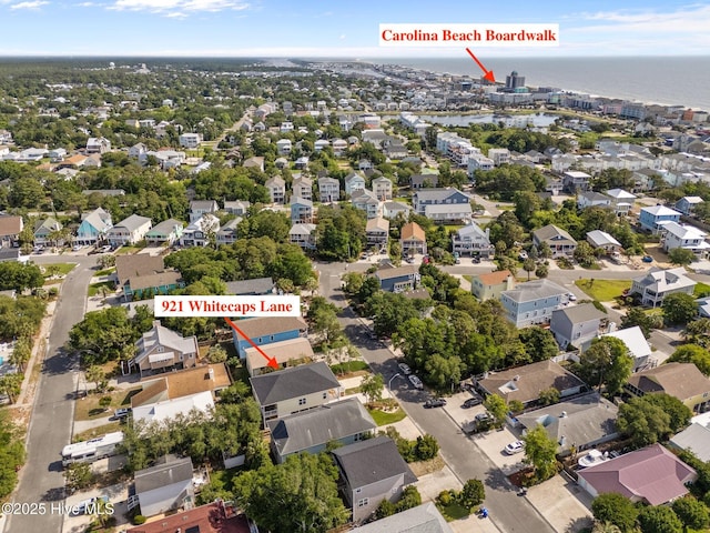921 Whitecaps Ln, Carolina Beach, NC 28428 - aerial view of property and surrounding area featuring a large body of water and nearby suburban area