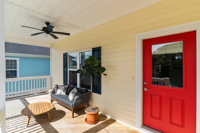 921 Whitecaps Ln, Carolina Beach, NC 28428 - entrance to property with a ceiling fan and a porch