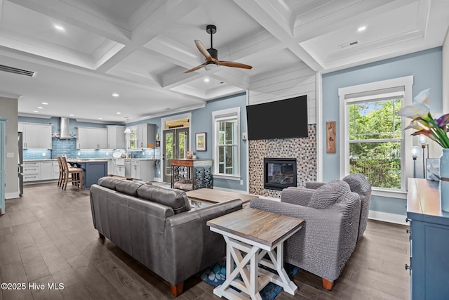 3528 Cordgrass Ln, Wilmington, NC 28409 - living area with a fireplace, dark wood-style flooring, ceiling fan, plenty of natural light, and recessed lighting