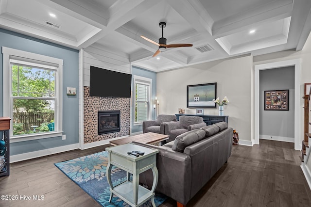 3528 Cordgrass Ln, Wilmington, NC 28409 - living area with baseboards, dark wood-style floors, a ceiling fan, a tile fireplace, and coffered ceiling