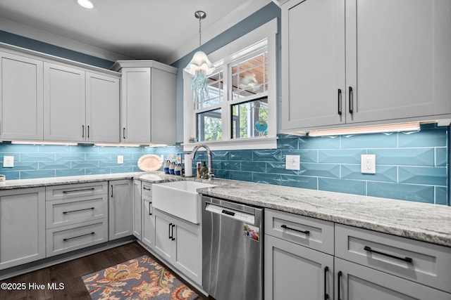 3528 Cordgrass Ln, Wilmington, NC 28409 - kitchen featuring dishwasher, a sink, dark wood-style flooring, tasteful backsplash, and hanging light fixtures