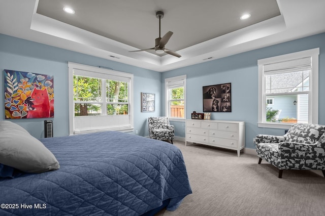 3528 Cordgrass Ln, Wilmington, NC 28409 - carpeted bedroom featuring a raised ceiling, baseboards, recessed lighting, and a ceiling fan