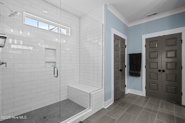 3528 Cordgrass Ln, Wilmington, NC 28409 - bathroom featuring a stall shower, baseboards, a closet, and ornamental molding