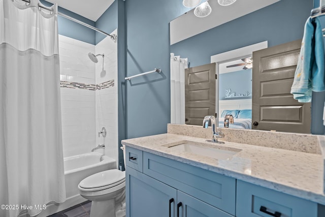 3528 Cordgrass Ln, Wilmington, NC 28409 - full bath featuring vanity, shower / bath combo with shower curtain, ensuite bathroom, toilet, and a ceiling fan
