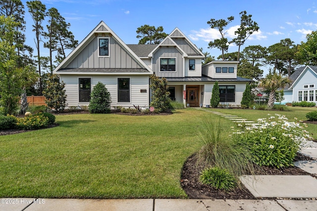 3528 Cordgrass Ln, Wilmington, NC 28409 - view of front facade with board and batten siding and a porch