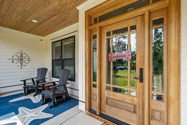 3528 Cordgrass Ln, Wilmington, NC 28409 - doorway to property featuring a porch