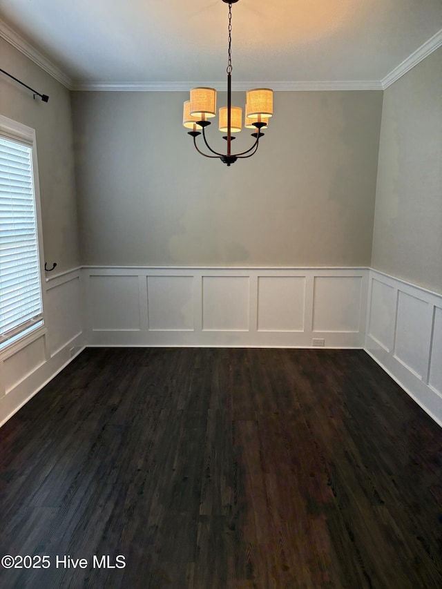 3509 Holman Way Unit B, Greenville, NC 27834 - unfurnished dining area with a chandelier, ornamental molding, dark wood-style flooring, a wainscoted wall, and a decorative wall