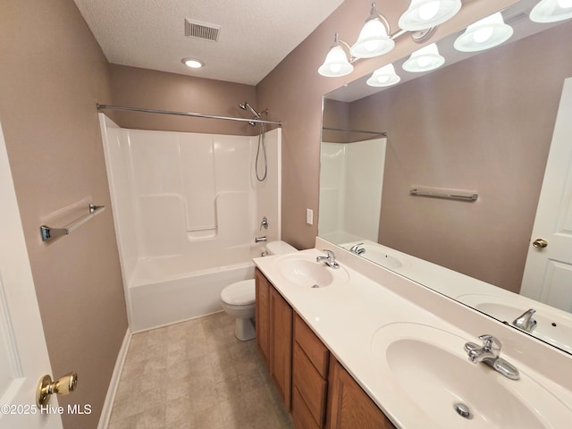 403 Mathew Andrew Ct, Swansboro, NC 28584 - full bathroom with a textured ceiling, toilet, tile patterned floors, double vanity, and baseboards