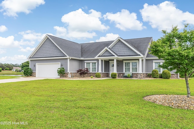 craftsman inspired home with concrete driveway, an attached garage, a front lawn, and stone siding