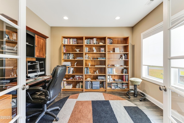 home office featuring wood finished floors, baseboards, and recessed lighting