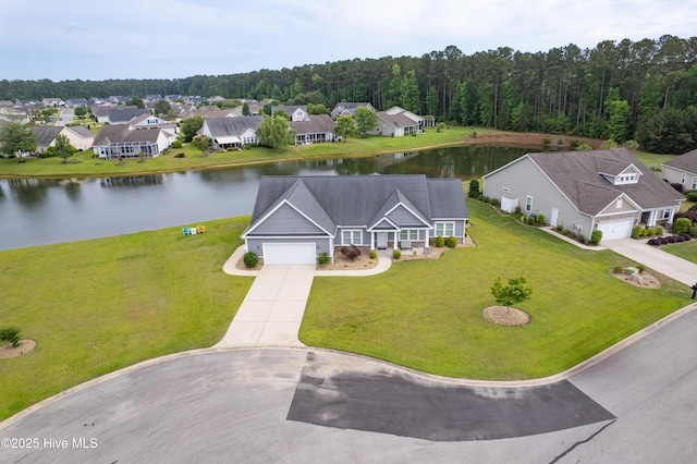 aerial view of residential area with a nearby body of water
