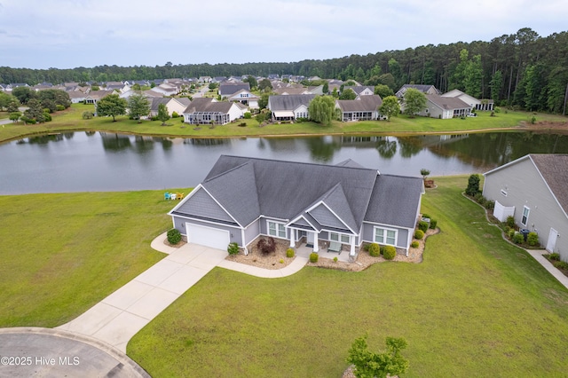 aerial perspective of suburban area with a large body of water