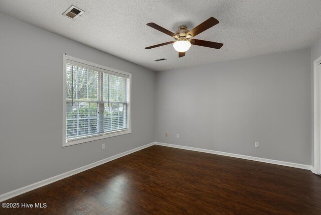 5126 Lamppost Cir, Wilmington, NC 28403 - empty room with dark wood finished floors, ceiling fan, baseboards, and a textured ceiling