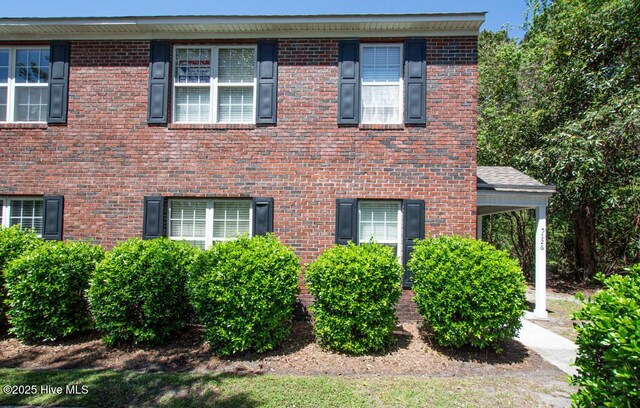 5126 Lamppost Cir, Wilmington, NC 28403 - view of side of property with brick siding