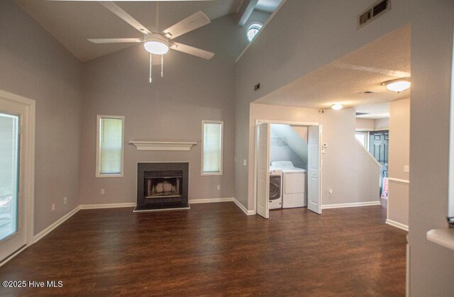 5126 Lamppost Cir, Wilmington, NC 28403 - unfurnished living room with washer and clothes dryer, wood finished floors, high vaulted ceiling, a ceiling fan, and baseboards