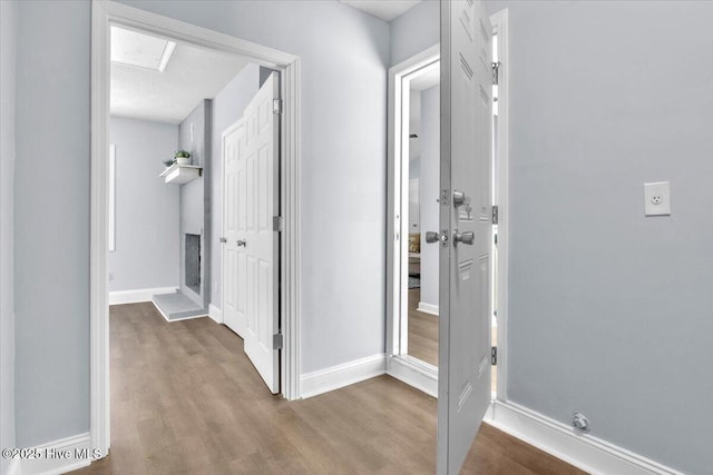 235 Zachary Ln, Hubert, NC 28539 - hallway featuring wood finished floors and baseboards