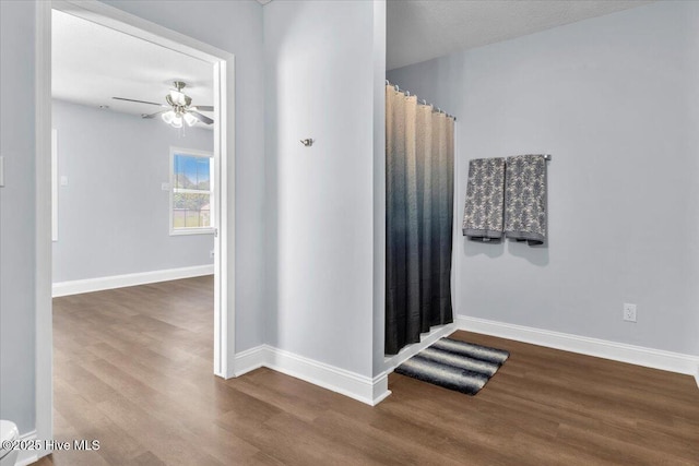 235 Zachary Ln, Hubert, NC 28539 - full bathroom featuring wood finished floors, a ceiling fan, and baseboards