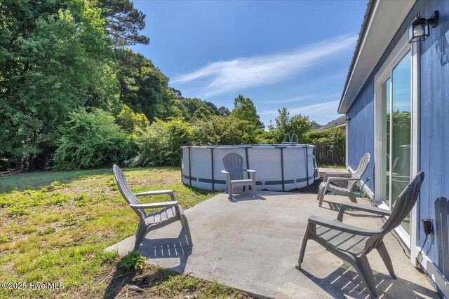 235 Zachary Ln, Hubert, NC 28539 - view of patio / terrace featuring an outdoor pool