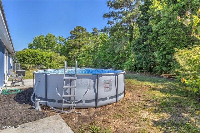 235 Zachary Ln, Hubert, NC 28539 - view of yard featuring an outdoor pool