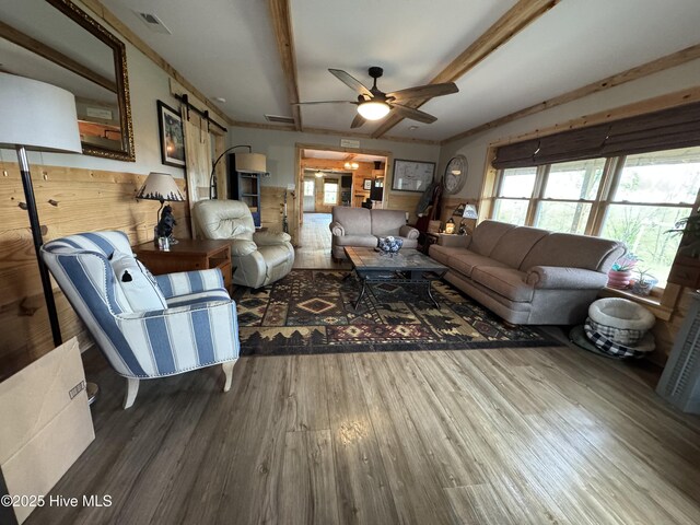 200 Wintergreen Patch Ln, Burnsville, NC 28714 - living area with wood finished floors, a ceiling fan, and beamed ceiling
