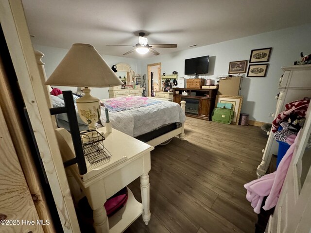 200 Wintergreen Patch Ln, Burnsville, NC 28714 - bedroom with wood finished floors and a ceiling fan